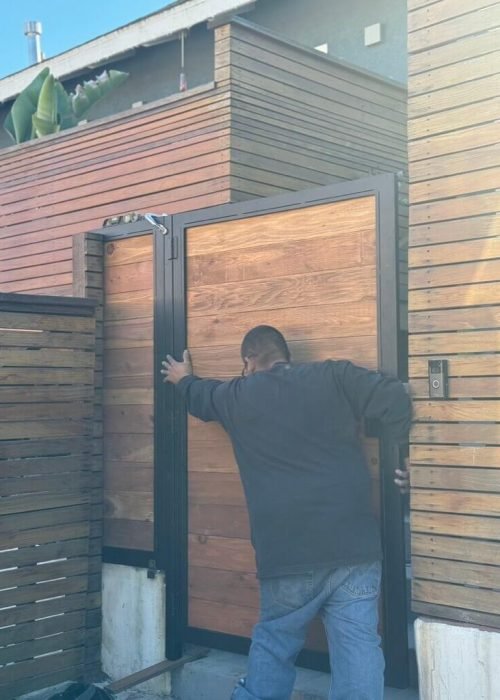 Man working on Wood Gate